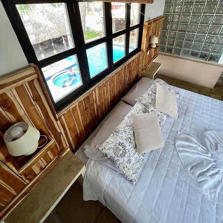 Johnnys Place Hotel Monterrico Bagian luar foto